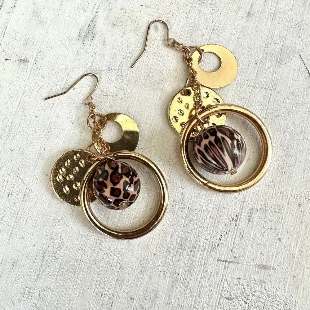 Gold tone charm drop earrings